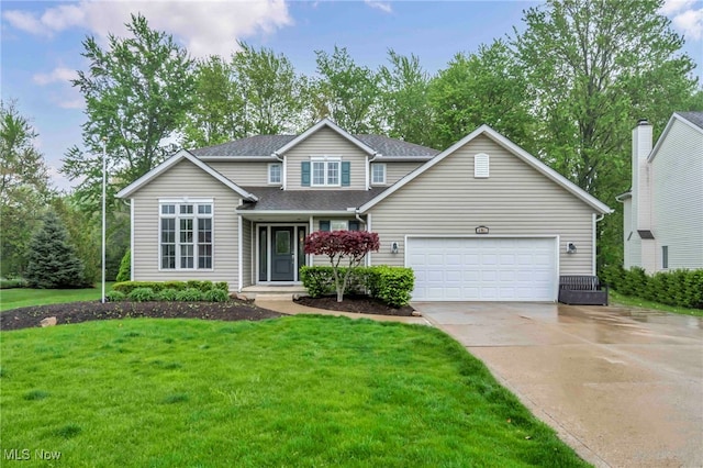 traditional-style home with concrete driveway, an attached garage, a shingled roof, and a front lawn