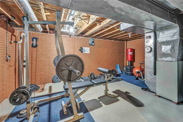 workout area with brick wall