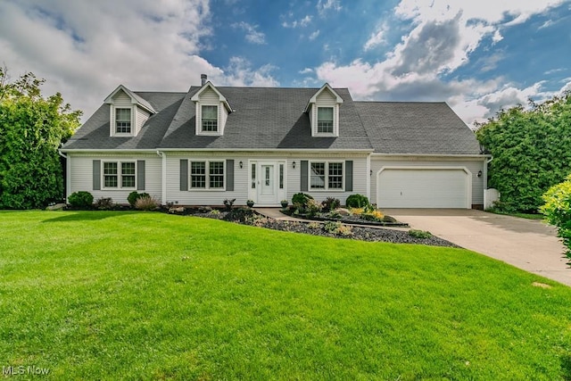 cape cod-style house featuring concrete driveway, an attached garage, and a front yard