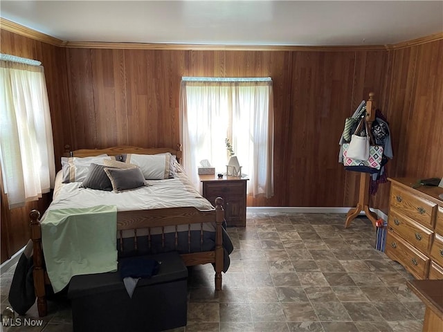 9207 Plank Rd, North Bloomfield, OH 44450 - bedroom featuring wooden walls and stone finish floors