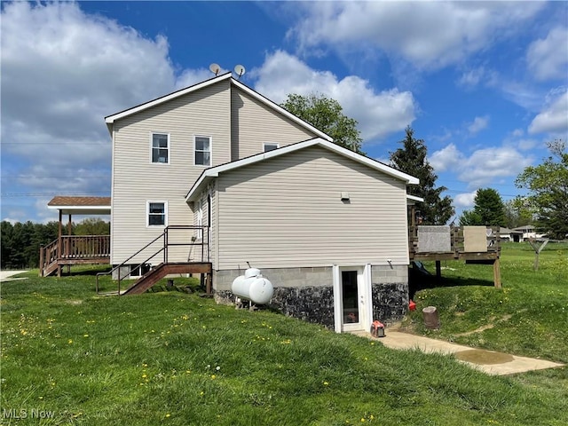 9207 Plank Rd, North Bloomfield, OH 44450 - view of property exterior featuring a yard and a deck