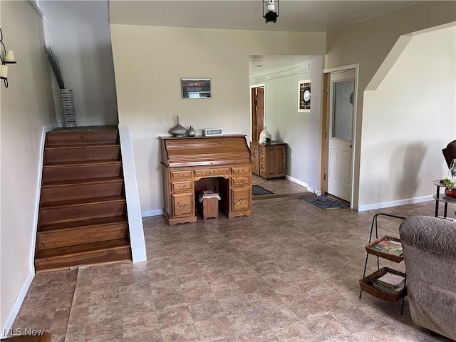9207 Plank Rd, North Bloomfield, OH 44450 - living room with stairway and baseboards