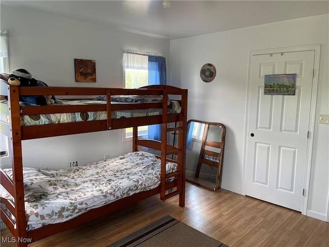 9207 Plank Rd, North Bloomfield, OH 44450 - bedroom featuring wood finished floors