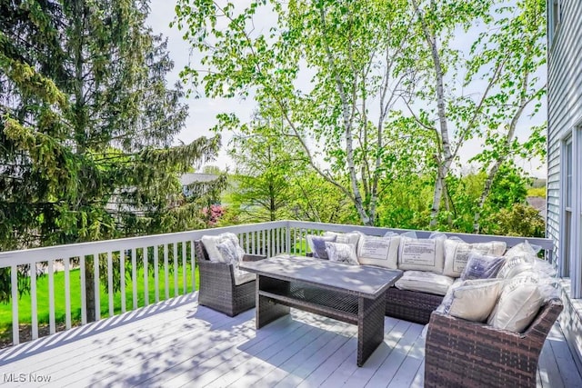 deck featuring an outdoor living space