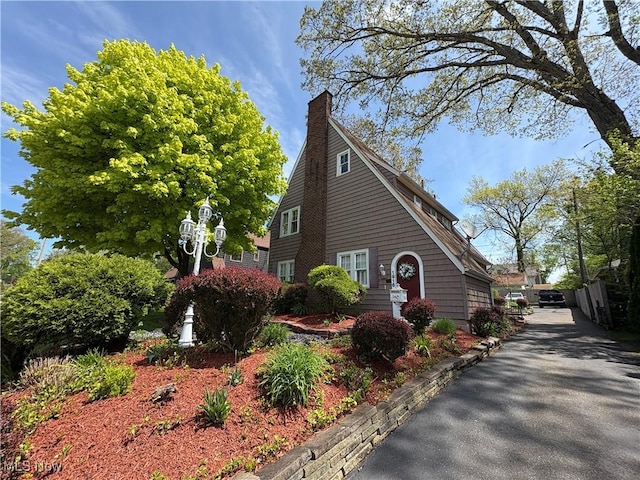 1916 Frazer Ave NW, Canton, OH 44709 - view of front of home with a chimney
