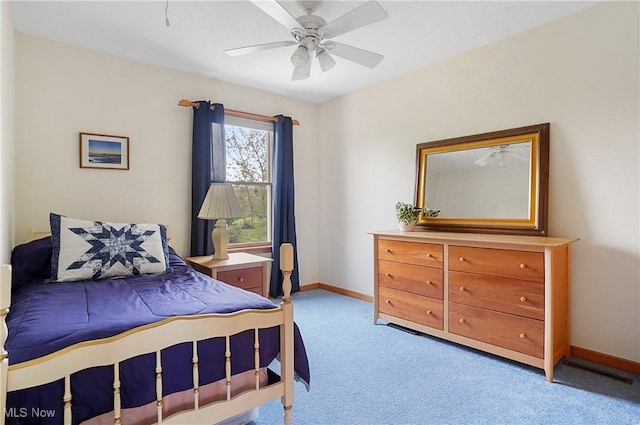 6972 Stagecoach Trl, Valley City, OH 44280 - bedroom featuring light carpet, baseboards, and a ceiling fan