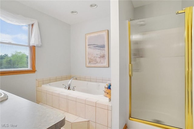 6972 Stagecoach Trl, Valley City, OH 44280 - bathroom with a stall shower, a bath, and vanity