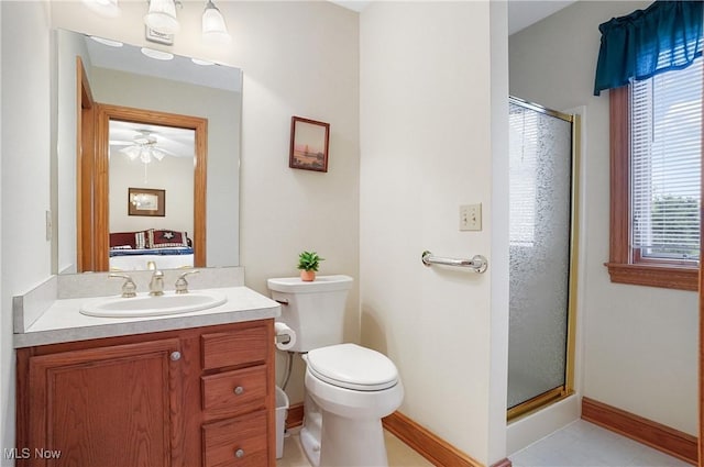 6972 Stagecoach Trl, Valley City, OH 44280 - ensuite bathroom featuring vanity, a stall shower, toilet, and baseboards
