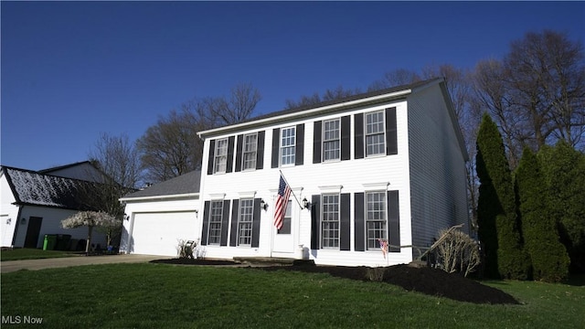 472 Vandalia Dr, Tallmadge, OH 44278 - colonial home featuring a garage, driveway, and a front yard