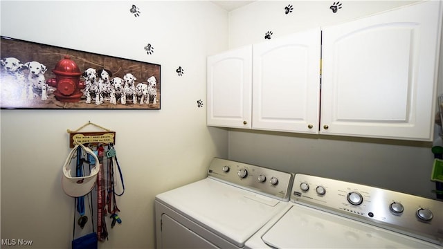 472 Vandalia Dr, Tallmadge, OH 44278 - washroom featuring separate washer and dryer and cabinet space
