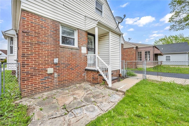 4110 Ellison Rd, South Euclid, OH 44121 - entrance to property with a gate and brick siding