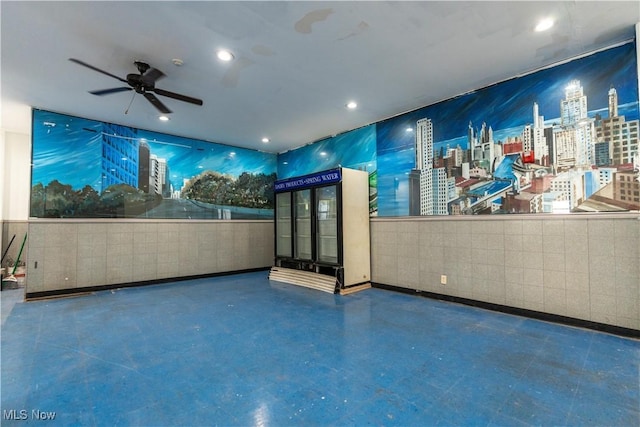 1016 12th St NE, Canton, OH 44704 - view of patio with ceiling fan and a view of city