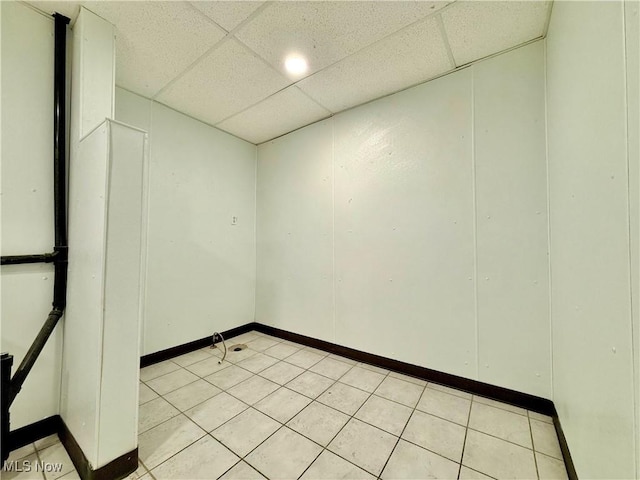 1016 12th St NE, Canton, OH 44704 - spare room with a drop ceiling and baseboards