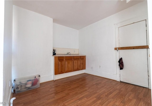 1016 12th St NE, Canton, OH 44704 - unfurnished room with wood finished floors and a sink