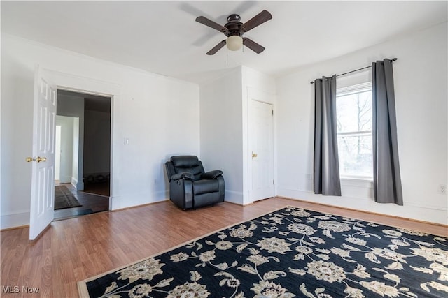 1016 12th St NE, Canton, OH 44704 - unfurnished room featuring a ceiling fan, wood finished floors, and baseboards