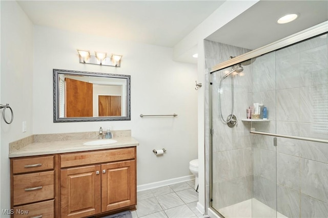 2530 Holgate Rd, Akron, OH 44313 - full bath with a shower stall, vanity, baseboards, toilet, and recessed lighting