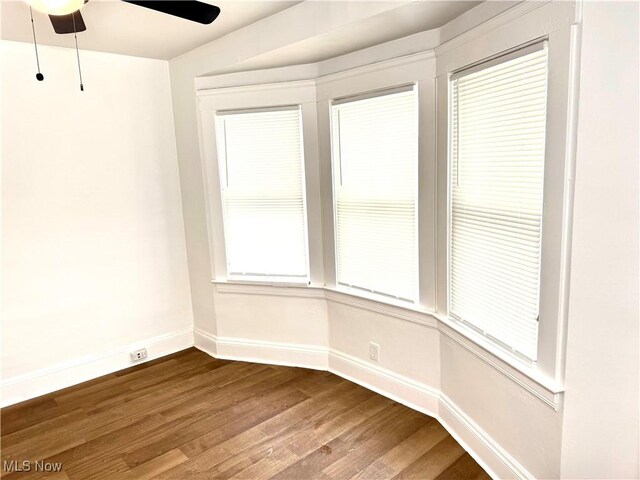 3631 E 104th St, Cleveland, OH 44105 - unfurnished room featuring baseboards, dark wood-style flooring, and ceiling fan