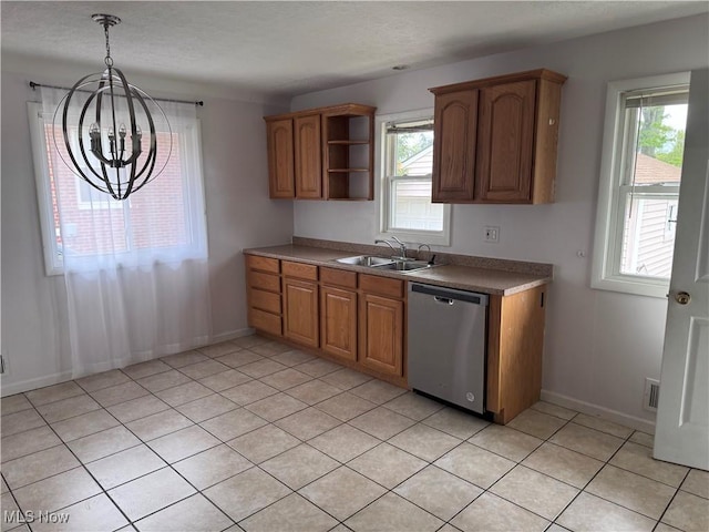 1422 Lorimer Rd, Parma, OH 44134 - kitchen featuring stainless steel dishwasher, a chandelier, a sink, open shelves, and brown cabinets
