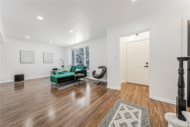 4073 Bushnell Rd, University Heights, OH 44118 - sitting room with ornamental molding, wood finished floors, baseboards, and recessed lighting