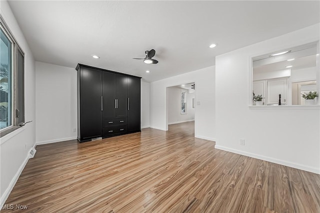 4073 Bushnell Rd, University Heights, OH 44118 - spare room featuring light wood-style floors, ceiling fan, baseboards, and recessed lighting