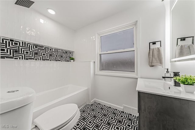 4073 Bushnell Rd, University Heights, OH 44118 - full bath with toilet, tile patterned floors, vanity, and baseboards