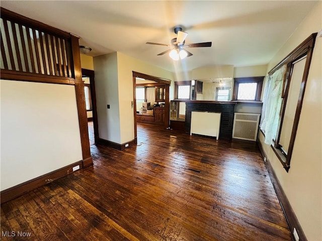 3405 E 123rd St, Cleveland, OH 44120 - unfurnished living room with plenty of natural light, wood-type flooring, ceiling fan, and baseboards