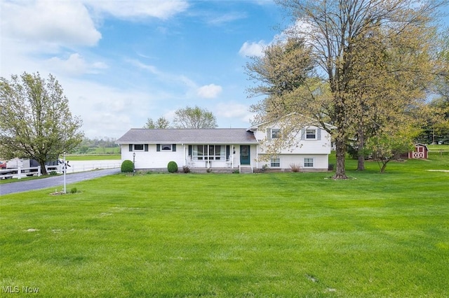 16139 E Main St, Mount Eaton, OH 44659 - view of front of home featuring a front lawn and driveway