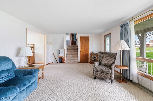16139 E Main St, Mount Eaton, OH 44659 - carpeted living area with stairs and baseboards