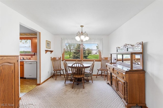 16139 E Main St, Mount Eaton, OH 44659 - dining room with a chandelier and baseboards