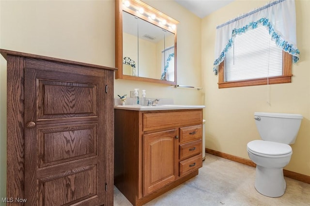 16139 E Main St, Mount Eaton, OH 44659 - bathroom with baseboards, toilet, and vanity