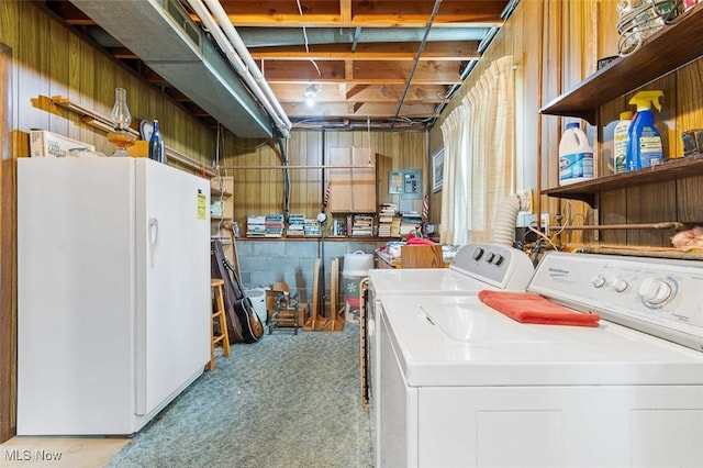 16139 E Main St, Mount Eaton, OH 44659 - laundry area featuring washing machine and dryer and carpet flooring