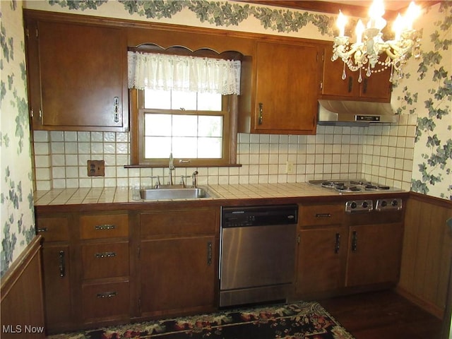 64 S Cadillac Dr, Boardman, OH 44512 - kitchen featuring stainless steel appliances, wallpapered walls, range hood, a sink, and a chandelier