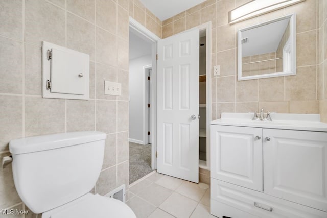 3843 Bendemeer Rd, Cleveland Heights, OH 44118 - bathroom with tile walls, tile patterned floors, toilet, and vanity