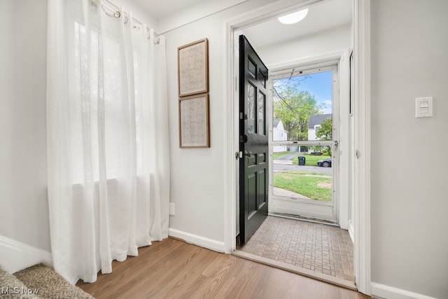 3843 Bendemeer Rd, Cleveland Heights, OH 44118 - foyer entrance featuring baseboards and wood finished floors