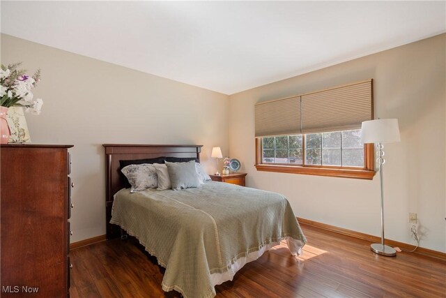 489 Paul Tell Trl, Tallmadge, OH 44278 - bedroom featuring baseboards and wood finished floors