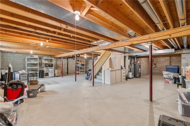 489 Paul Tell Trl, Tallmadge, OH 44278 - unfinished below grade area featuring water heater and stairway