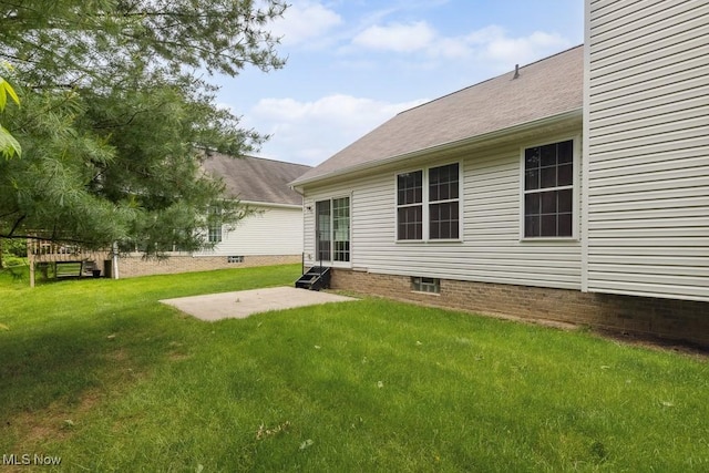 1250 Spring Ridge Cir, Alliance, OH 44601 - view of grassy yard featuring a patio area and entry steps
