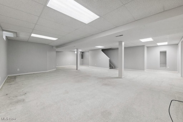 1250 Spring Ridge Cir, Alliance, OH 44601 - finished basement featuring a drop ceiling, stairs, baseboards, and carpet