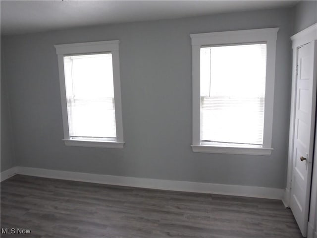 2067 W 105th St, Cleveland, OH 44102 - empty room featuring baseboards and wood finished floors