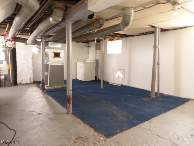 2067 W 105th St, Cleveland, OH 44102 - below grade area with washer / dryer, water heater, and heating unit