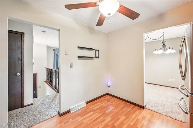 804 Cynthia Ct, Niles, OH 44446 - empty room featuring light wood-type flooring, baseboards, and ceiling fan