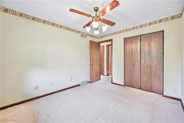 804 Cynthia Ct, Niles, OH 44446 - unfurnished bedroom featuring carpet flooring, baseboards, a closet, and ceiling fan