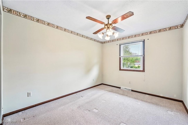 804 Cynthia Ct, Niles, OH 44446 - carpeted spare room with baseboards and a ceiling fan