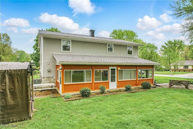804 Cynthia Ct, Niles, OH 44446 - rear view of property with a yard and a shingled roof