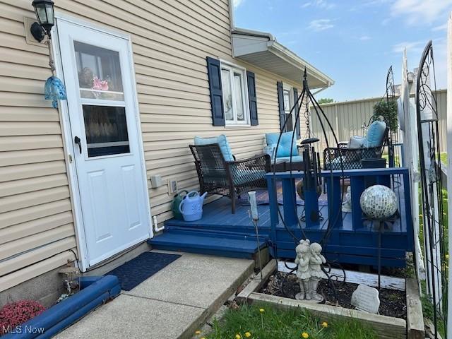 1845 Meadow Ln Unit B, Salem, OH 44460 - view of patio featuring a wooden deck
