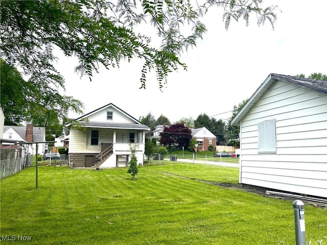 1632 Lawrence St, Parkersburg, WV 26101 - view of yard with stairs and covered porch