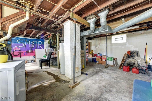 below grade area with washer / clothes dryer and water heater
