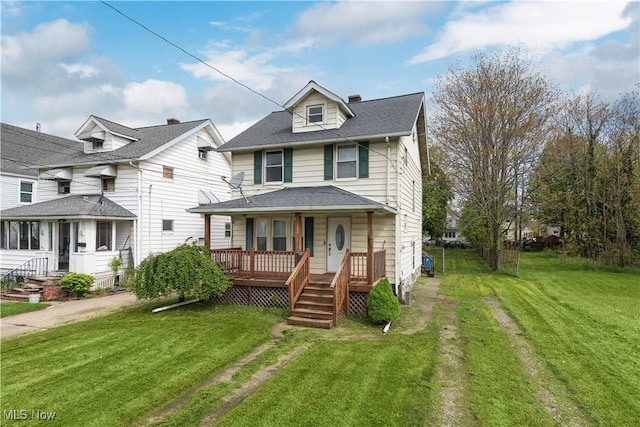 view of front of home featuring covered porch, a front lawn, a chimney, and a shingled roof