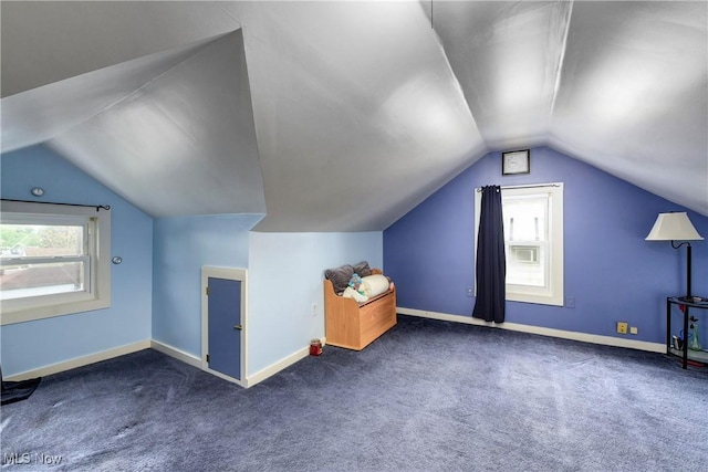bonus room featuring lofted ceiling, baseboards, and carpet flooring