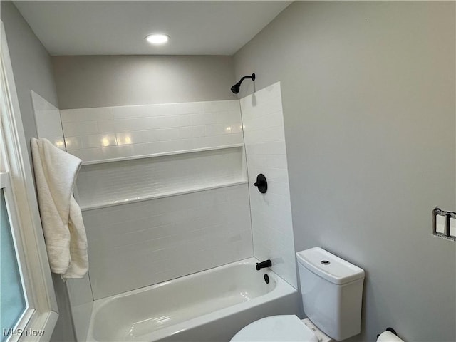 full bath featuring toilet and  shower combination